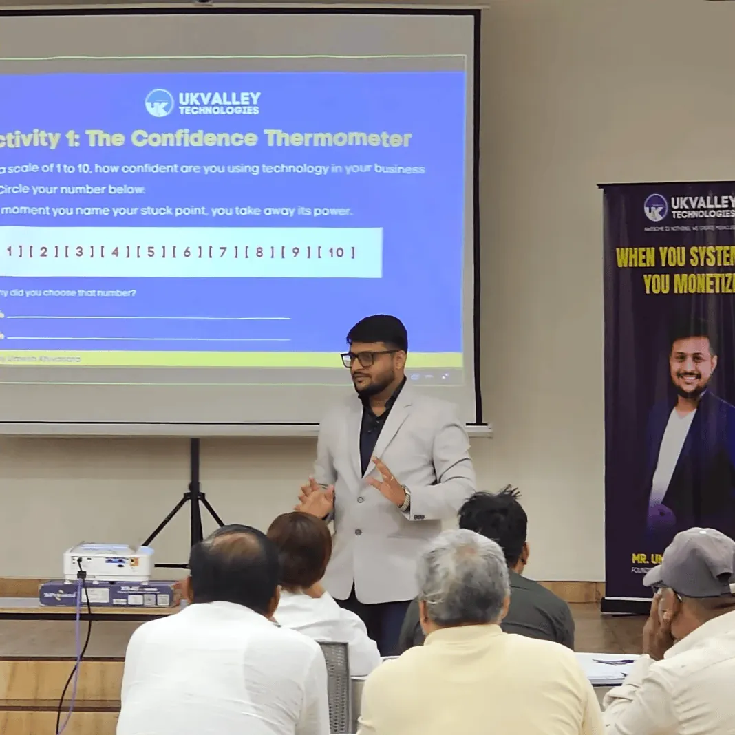 Umesh Khivasara teaching a workshop, with a technology confidence exercise projected behind him